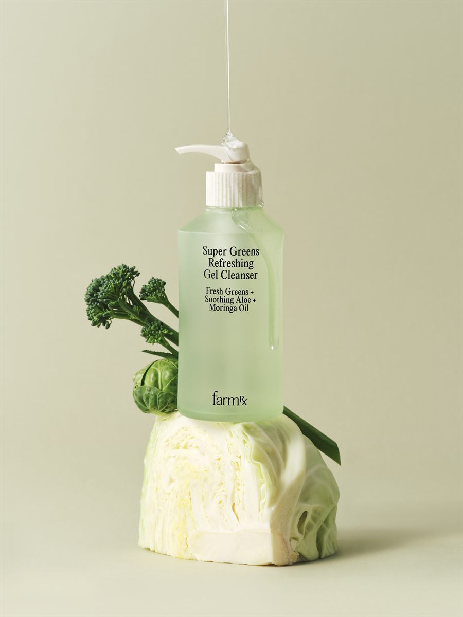 Gel cleanser balanced on a cabbage